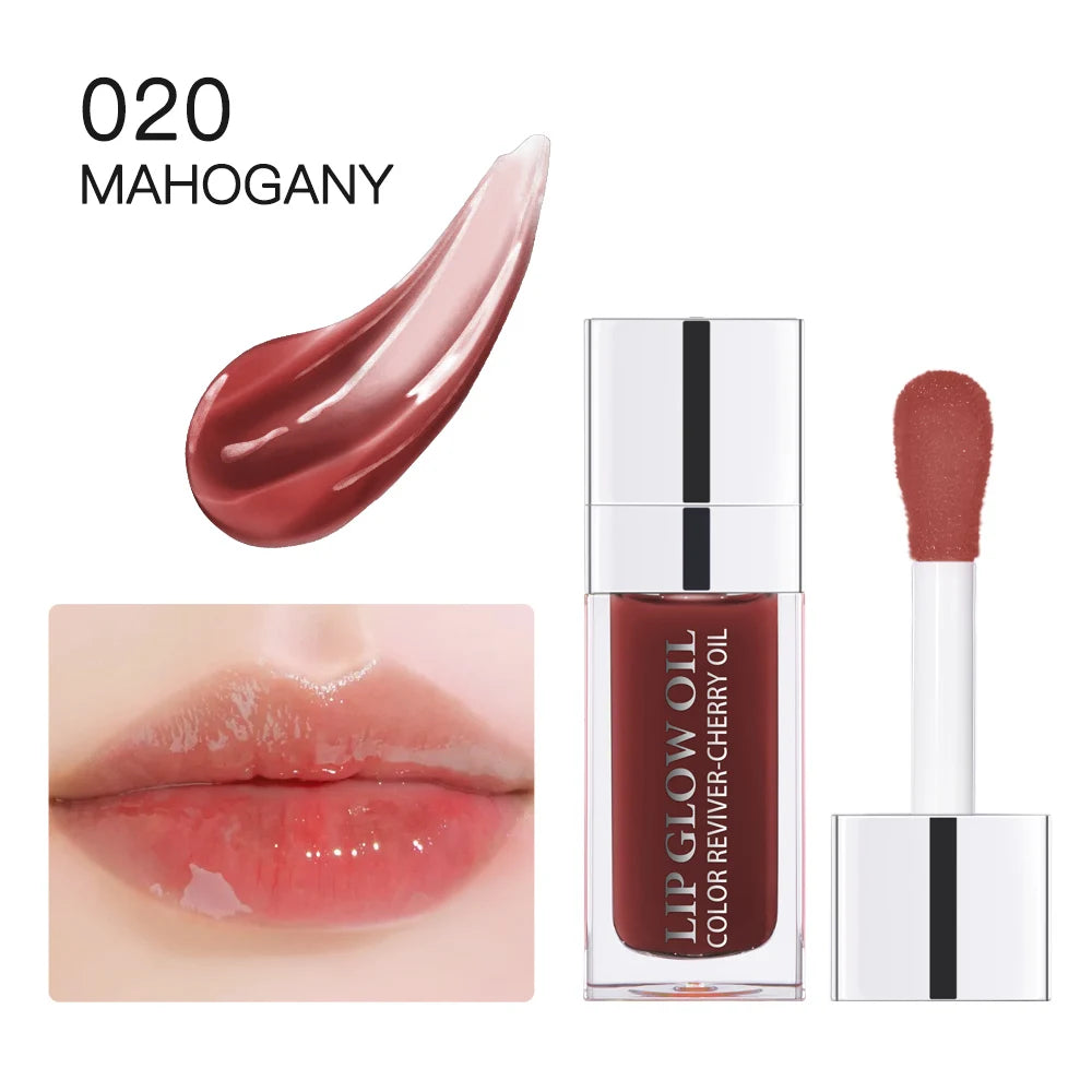 Mahogany crystal jelly lip oil in clear bottle with applicator, moisturizing tinted plumping gloss for shiny lips.