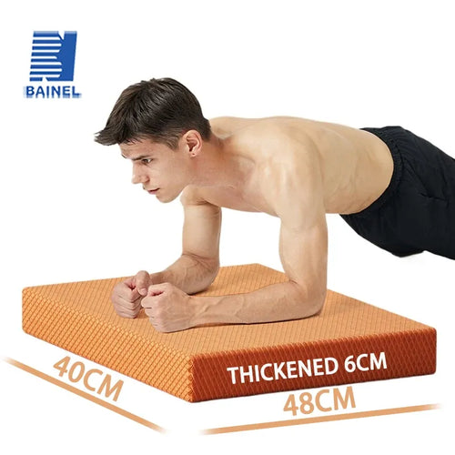 TPE Yoga Balance Mat, 6cm thickened smart yoga mat for core plank training and kneeling, orange cushioned surface.