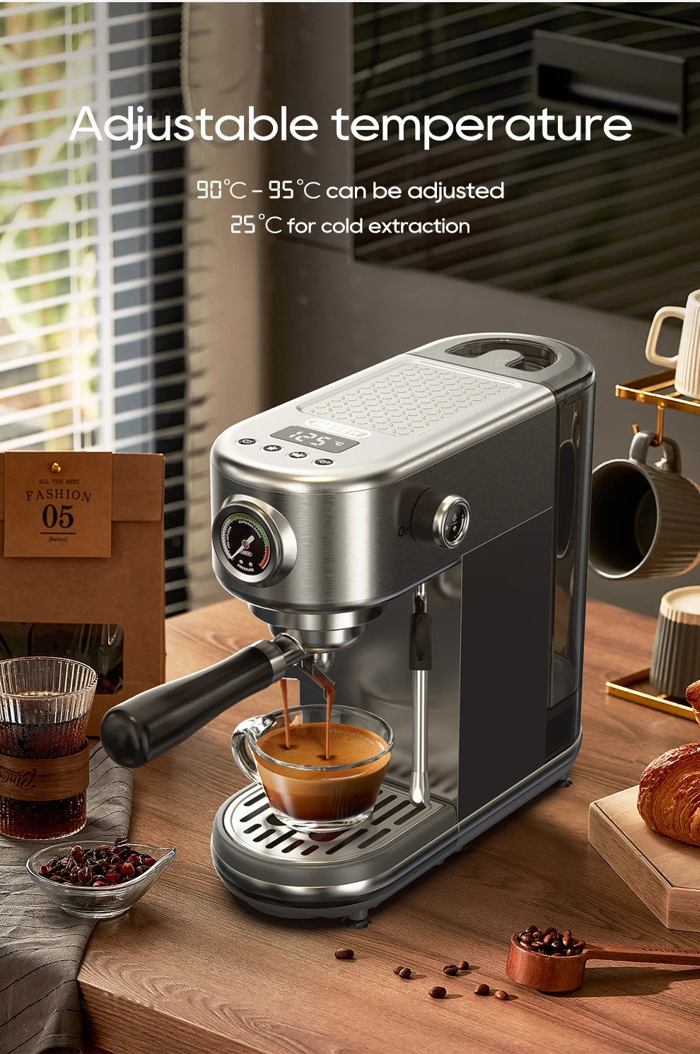Silver and black espresso coffee maker with digital display, pressure gauge, and steam wand on a kitchen counter.