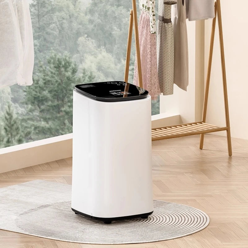 Tidesmit 60L automatic clothes dryer with baby clothing disinfection and air-drying wardrobe features, side view 4