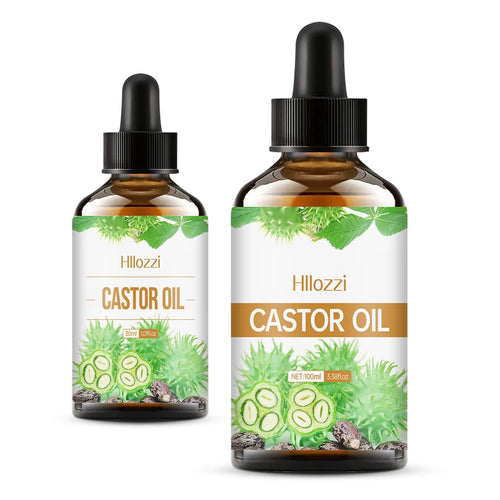 Castor oil wellness bottles in amber glass with dropper caps. Natural aromatherapy skincare product for hair and skin.