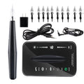 Black digital permanent makeup machine kit with pen, power supply, cables, and ten replacement needle cartridges.