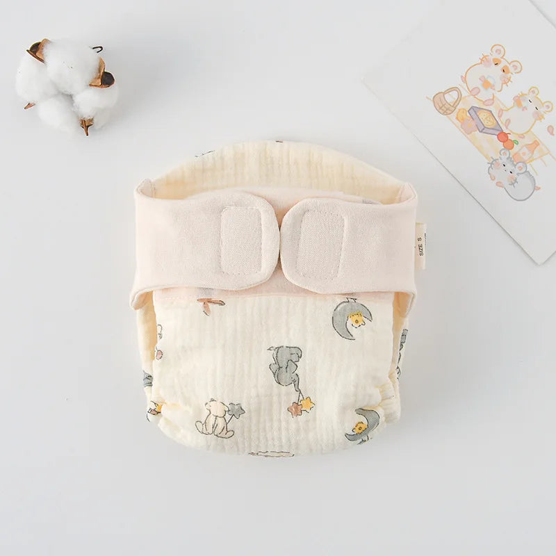 Size S baby cloth diaper with elephant and moon print, soft cotton material for baby care.