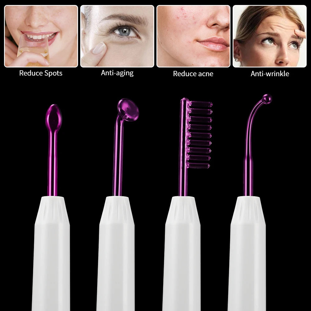 Four high-frequency facial wands with purple glass electrodes in various shapes attached to white handles.