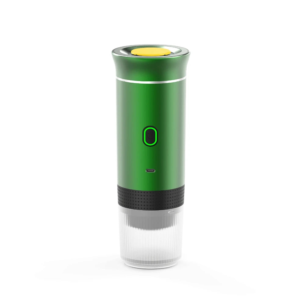 Green portable electric espresso maker with yellow cap, USB-C charging, and clear base on white background.