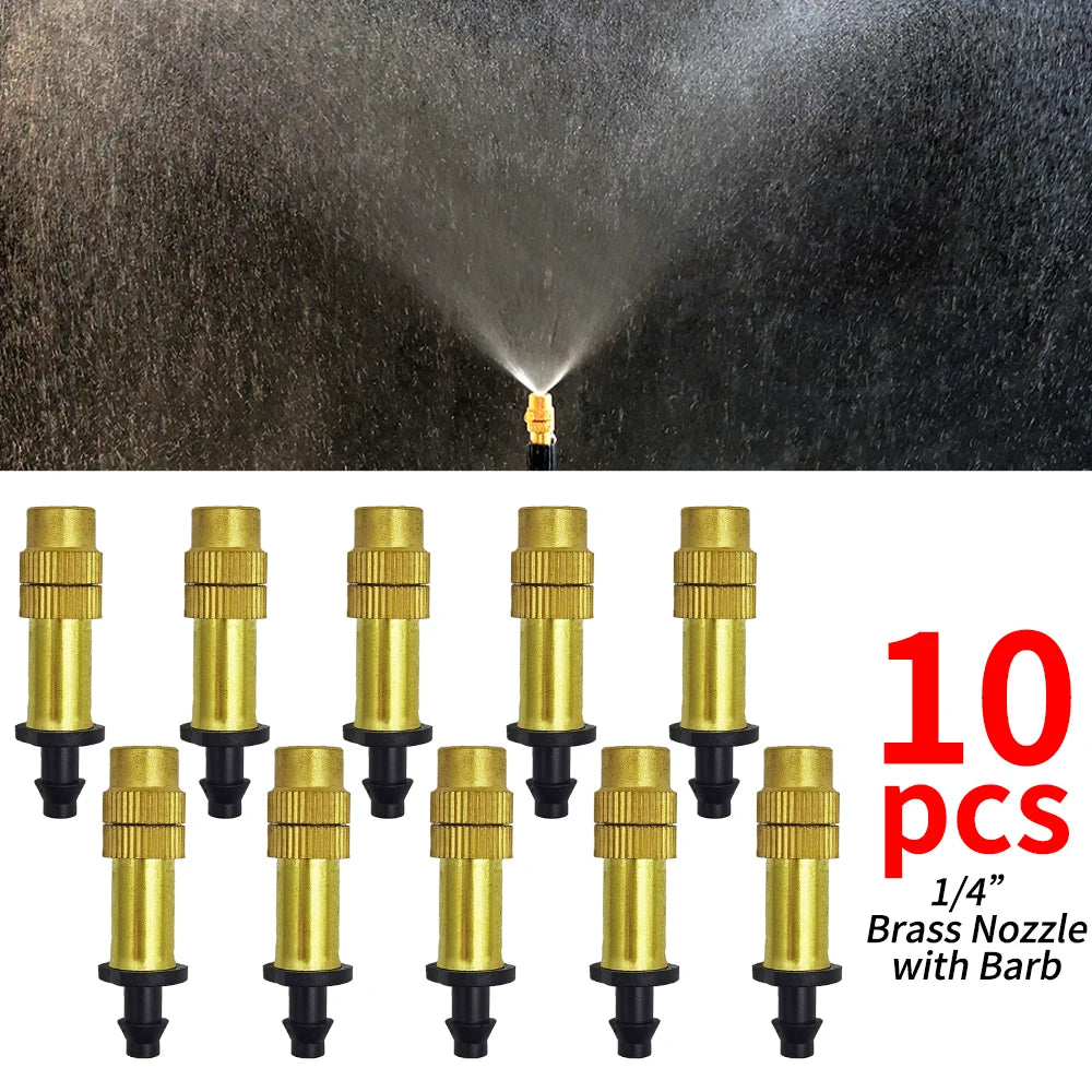Brass misting nozzles with black barbed connectors, showing spray plume