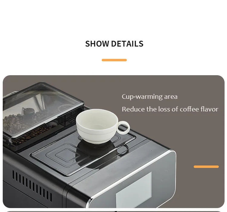 Black automatic espresso machine with top bean hopper and integrated cup-warming tray holding a white coffee cup.
