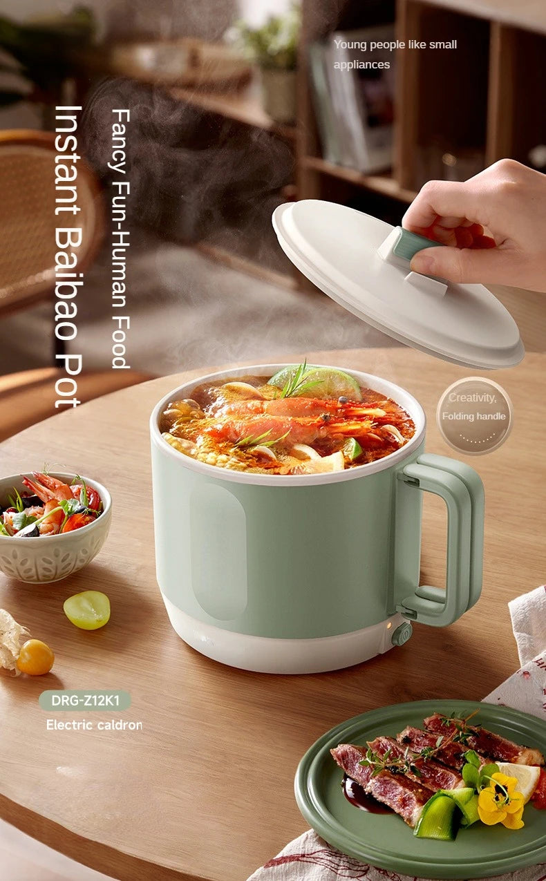 Electric hot pot cooker with mint-green pot, open lid, and serving spoon