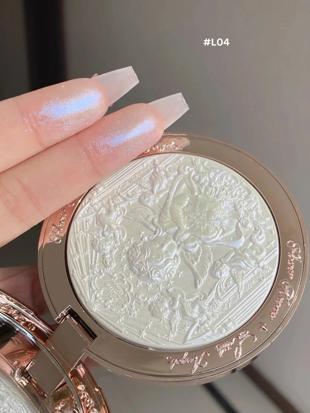 Tidesmit Flower Knows Little Angel embossed face highlighter palette detail view featuring 3D diamond glitter texture