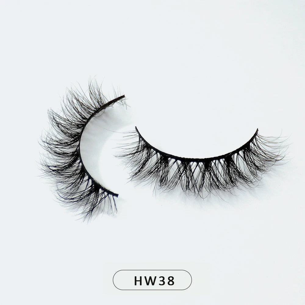 Pair of black 3D mink false eyelashes with a soft flex band on a white background, labeled model HW38.