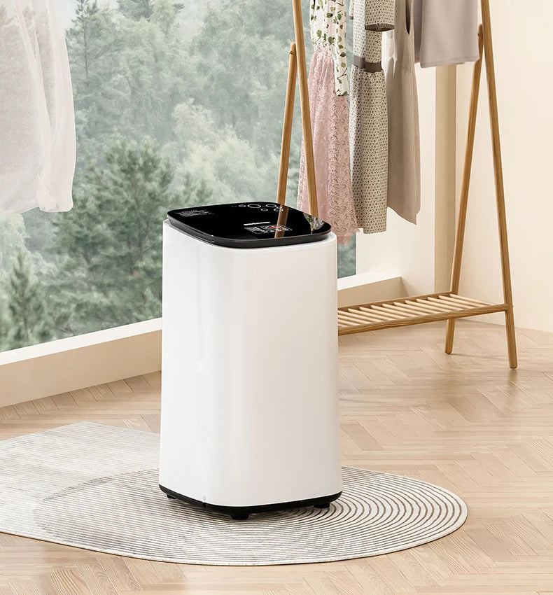 Tidesmit 60L automatic clothes dryer with baby clothing disinfection and air-drying wardrobe features, side view 21