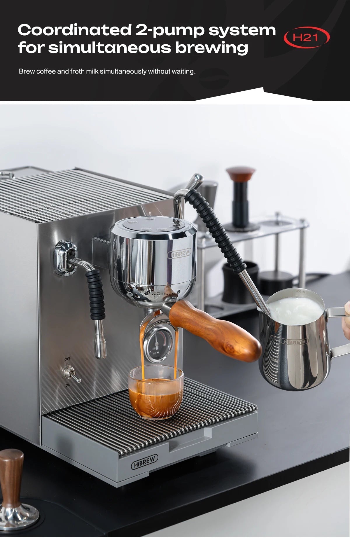 HiBREW H21 stainless steel dual-pump espresso machine pulling a shot and frothing milk with wood-handle portafilter.