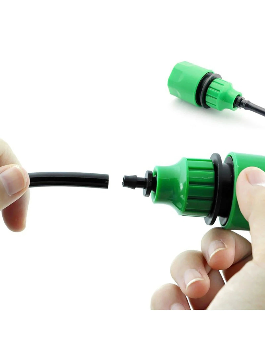 Hands inserting a barbed end into a green quick coupling adapter for hose connection
