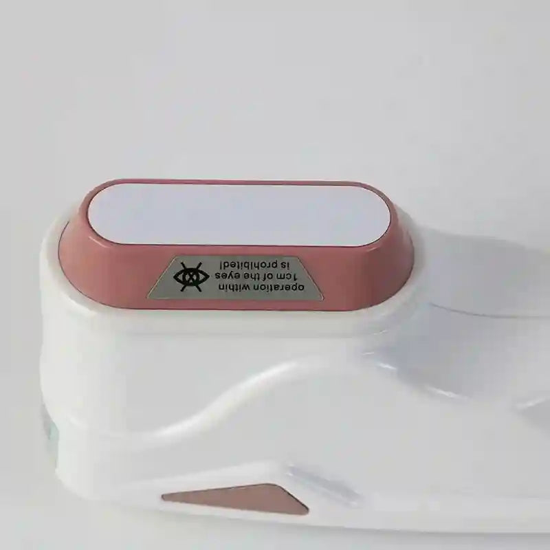 White and pink handheld professional mini HIFU face lifting machine for ultrasonic anti-aging skincare and wrinkles.