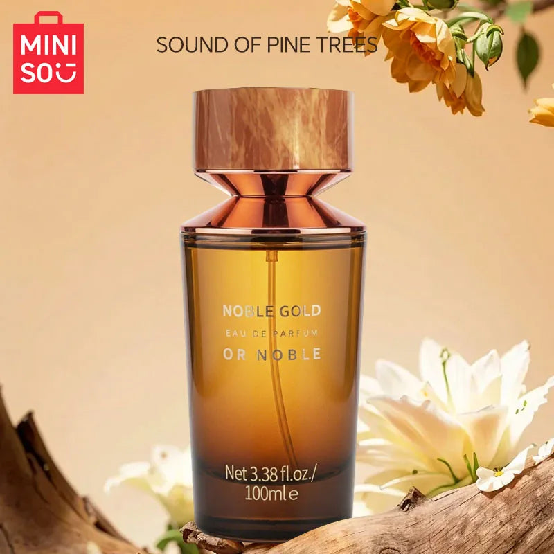 MINISO Noble Gold woody Eau de Parfum for men. Luxury 100ml cylindrical bottle with unique metallic brown cap.