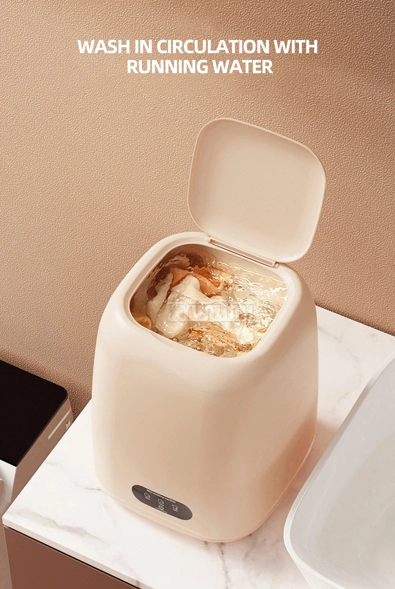 Tidesmit portable automatic mini washer cleaning small items like baby clothes, bras, and underwear from side angle.