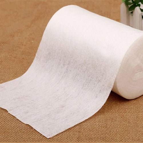 Soft, disposable cotton baby care wipes on a roll for gentle cleaning and diaper changes.