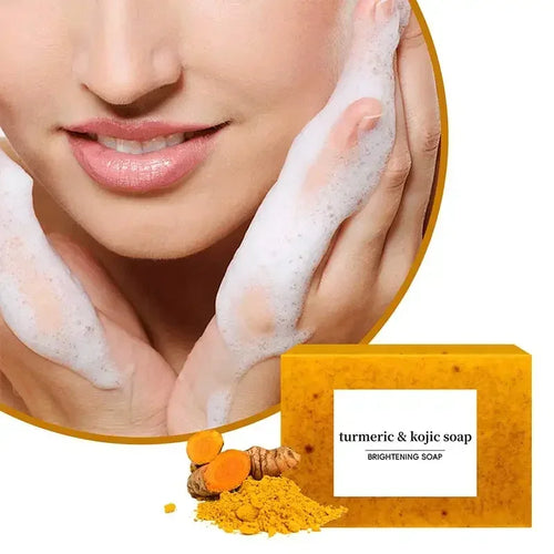 Yellow turmeric kojic soap bar for anti-inflammatory skincare, shown with raw turmeric root and powder.