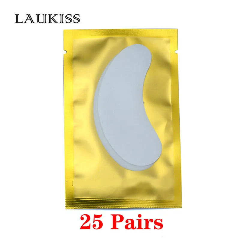 White, lint-free gel eye patches for eyelash extensions in a metallic gold foil individual sachet.