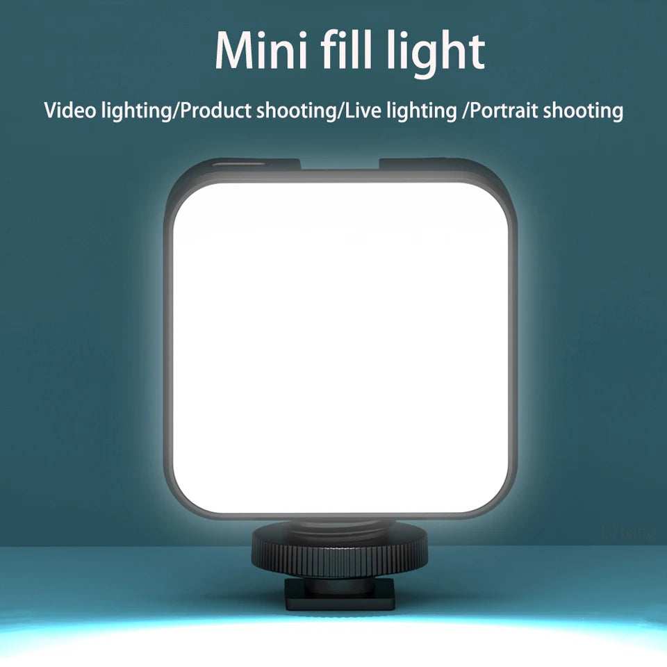 Square LED mini fill light with a black frame and cold shoe mount for photography and video lighting.