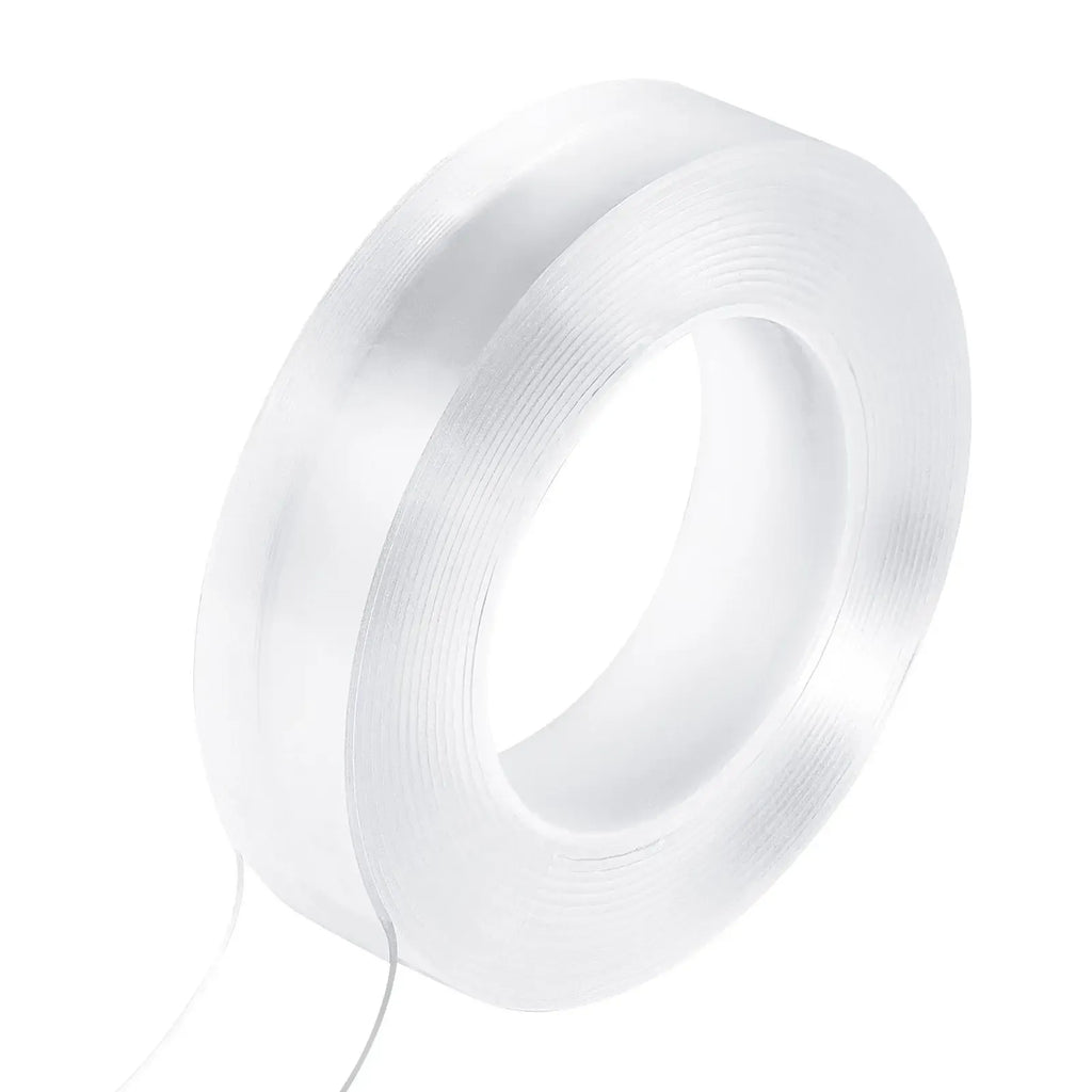 Clear double-sided tape roll with extended backing strip, continuous length