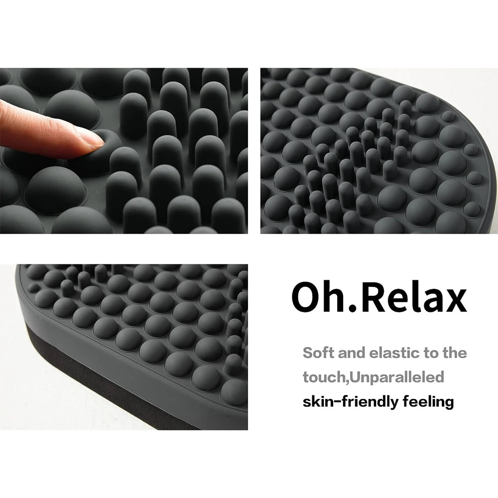 Grey silicone under desk foot rest with textured massage nodes for office comfort and plantar fasciitis relief.