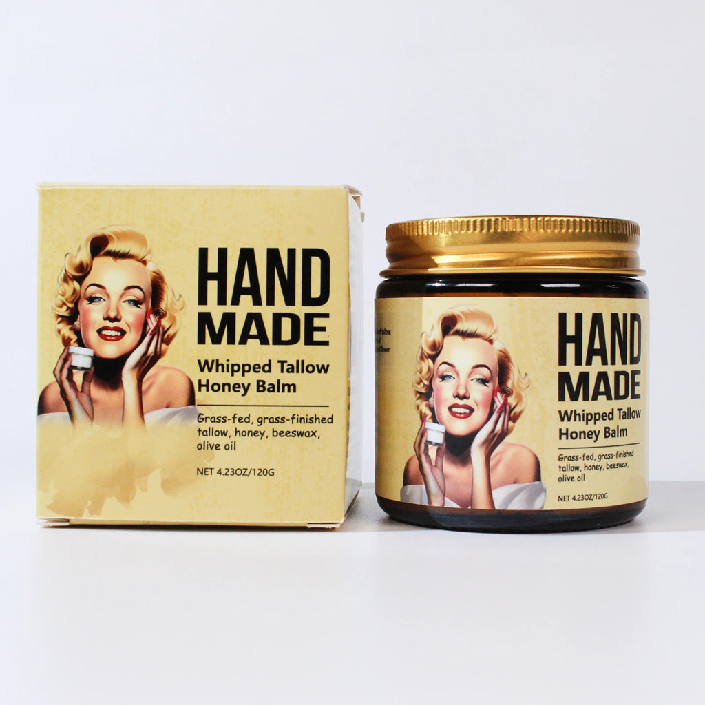ENVISHA handmade honey whipped tallow face cream in a glass jar and cardboard box for firming and moisturizing skin.