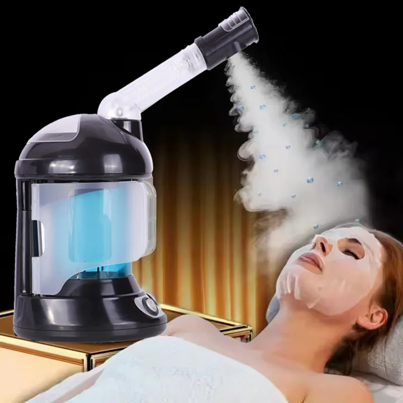 Black nano ionic facial steamer machine spraying warm ozone mist on woman with sheet mask for deep pore cleansing.
