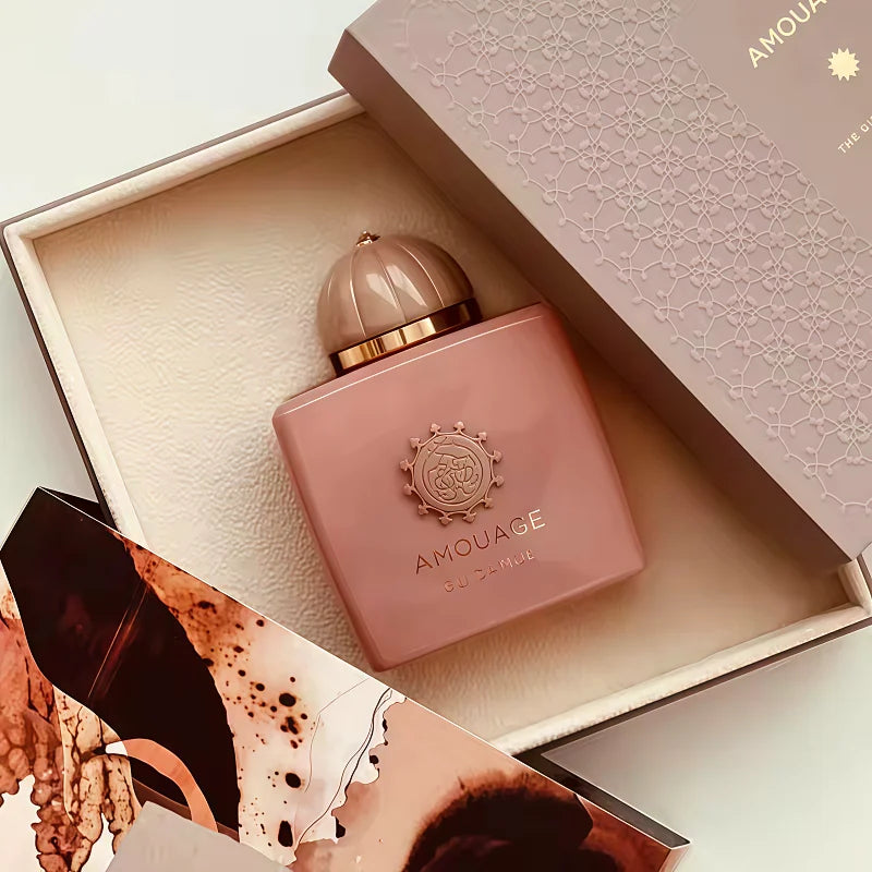 Amouage Guidance 46 unisex Eau de Parfum. Luxury woody oriental scent in a square rose pink bottle with ornate cap.