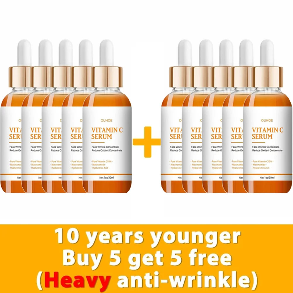 Ten 30ml amber glass bottles of Vitamin C face serum with white dropper caps, displayed in two groups of five.