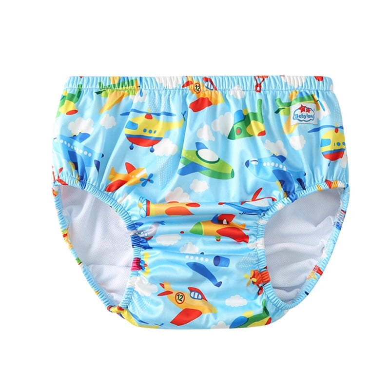Babyland reusable baby cloth swim diaper in blue with colorful airplane and helicopter print.