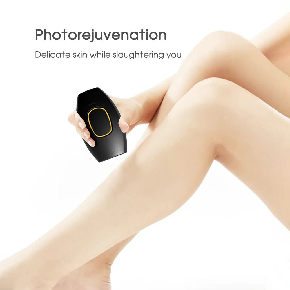 Handheld black IPL laser hair removal device for painless home use on legs, featuring a gold pulse button.
