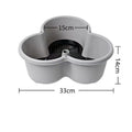 Grey plastic planter tower, 33cm wide x 14cm tall, with center drain tube