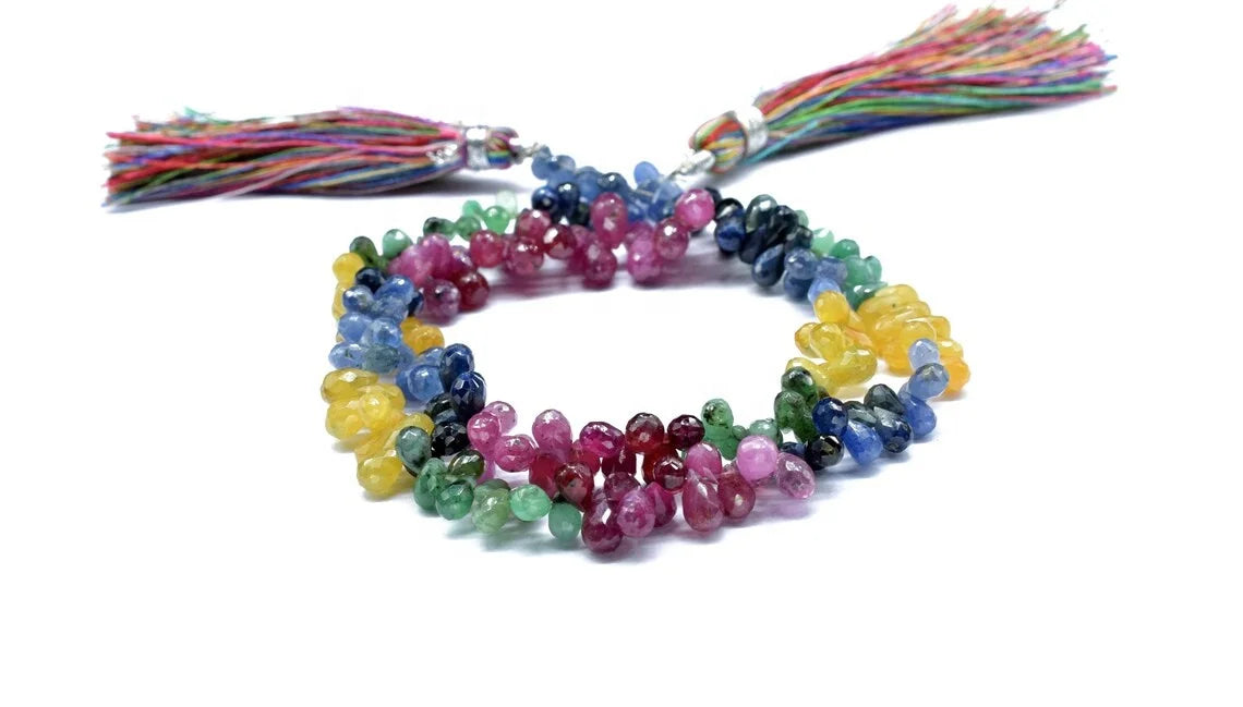 Folded multi-color faceted drop bead strand with tassels, 4x6mm beads