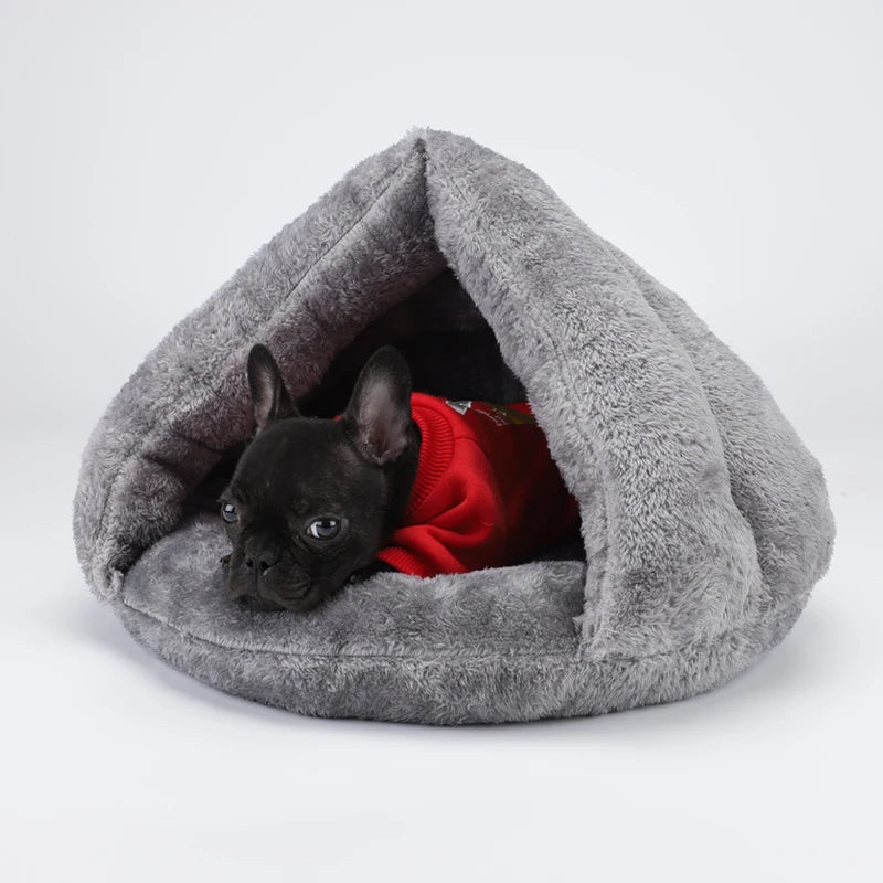 French Bulldog in a cozy, grey plush hooded dog bed, perfect for warm, washable comfort for small pets.