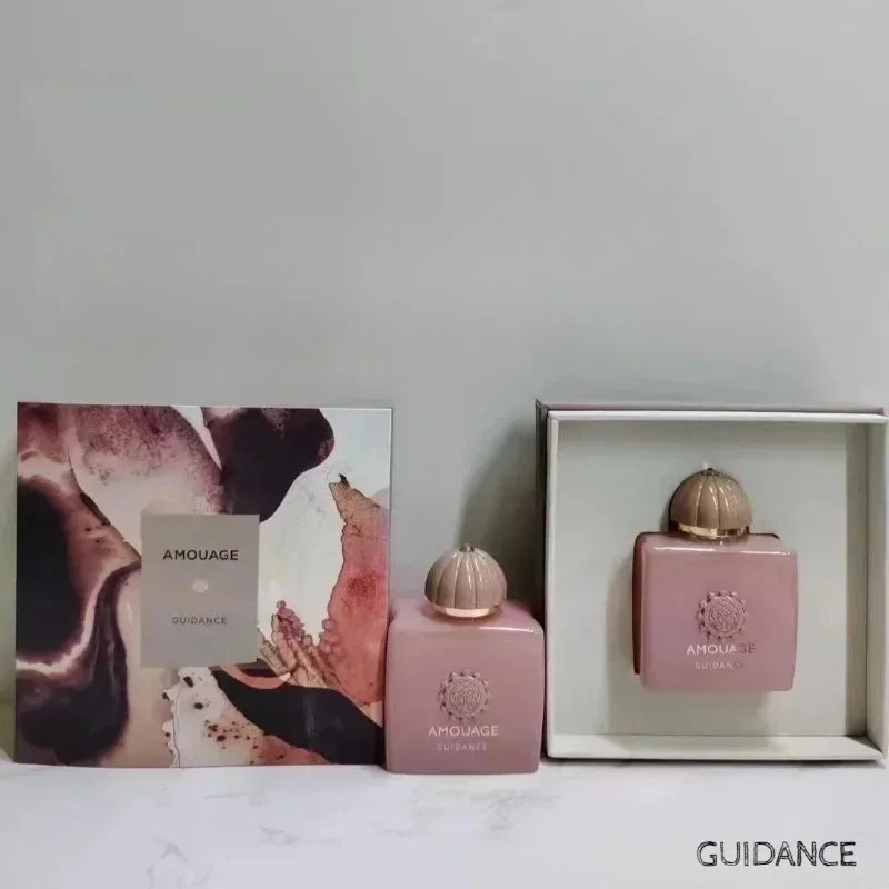 Amouage Guidance 46 floral fragrance: pink square bottle, decorative cap, and artistic box set for women.