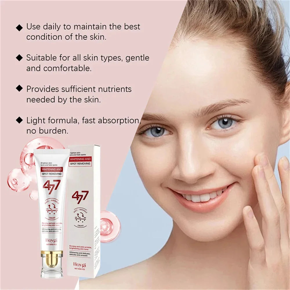 A woman touches her face next to a white Hoygi whitening and spot-removing cream tube and box with pink bubbles.