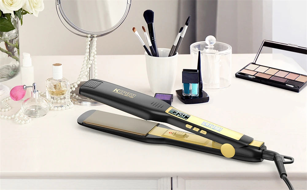 KIPOZI black and gold titanium flat iron hair straightener with digital LCD display on a vanity makeup table.
