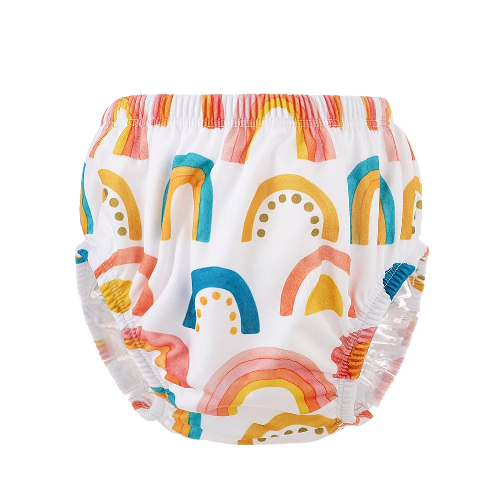 Reusable baby swim diaper with colorful rainbow print on white background, elastic waistband and leg cuffs.