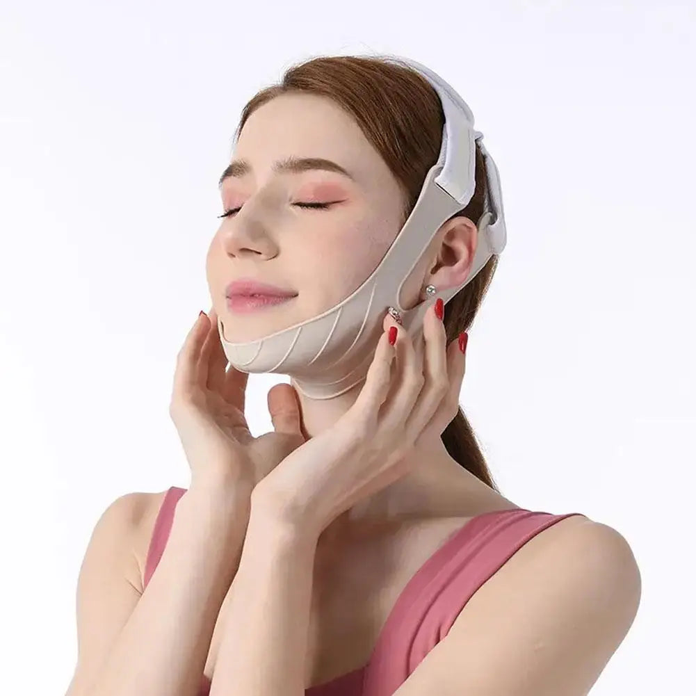 A woman wearing a beige, contoured V-line face slimming bandage strap over her chin and cheeks.