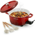 Red electric hot pot cooker with lid, side handles, and wooden utensils set