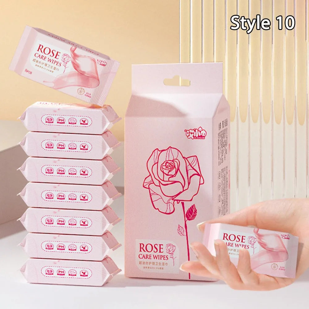 Rose Care baby wipes, 8-count travel packs, pink floral packaging, gentle baby skincare hygiene.