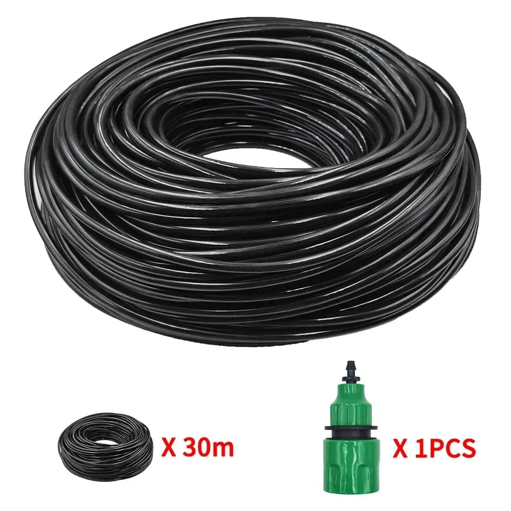 Black drip irrigation PVC hose coil with green connector, 30 m