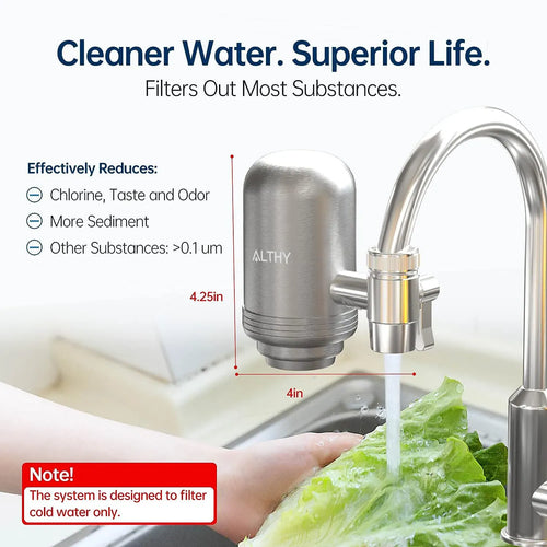 Stainless steel faucet water filter connected to a sink faucet with water flow