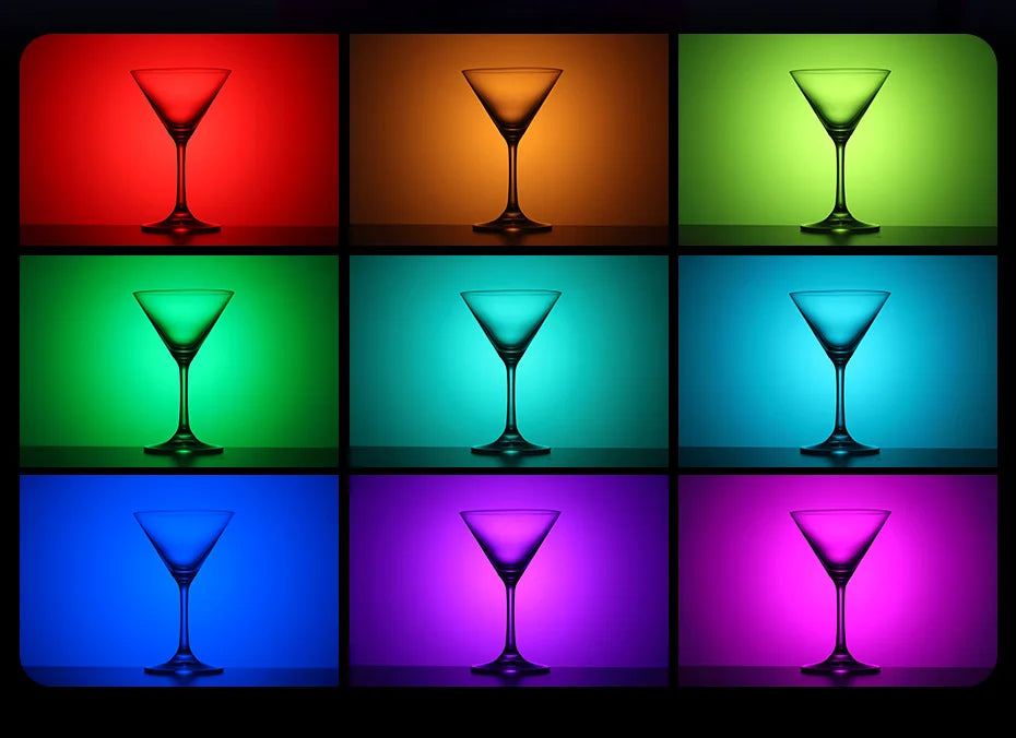 Martini glasses in a grid of nine vibrant LED light colors for cocktail presentation.