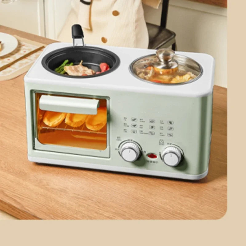 Mini 4-in-1 breakfast oven with mint body, glass door, black pan and covered steamer pot.