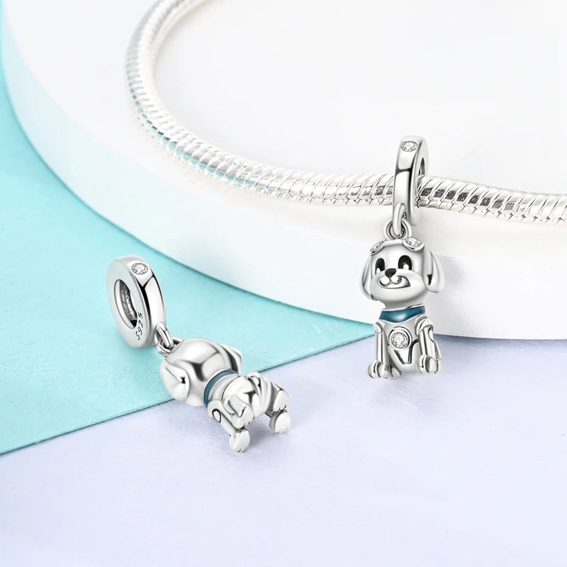 Cute 925 sterling silver puppy dog charm for charm bracelets. Sparkling pet-themed jewelry for dog lovers.