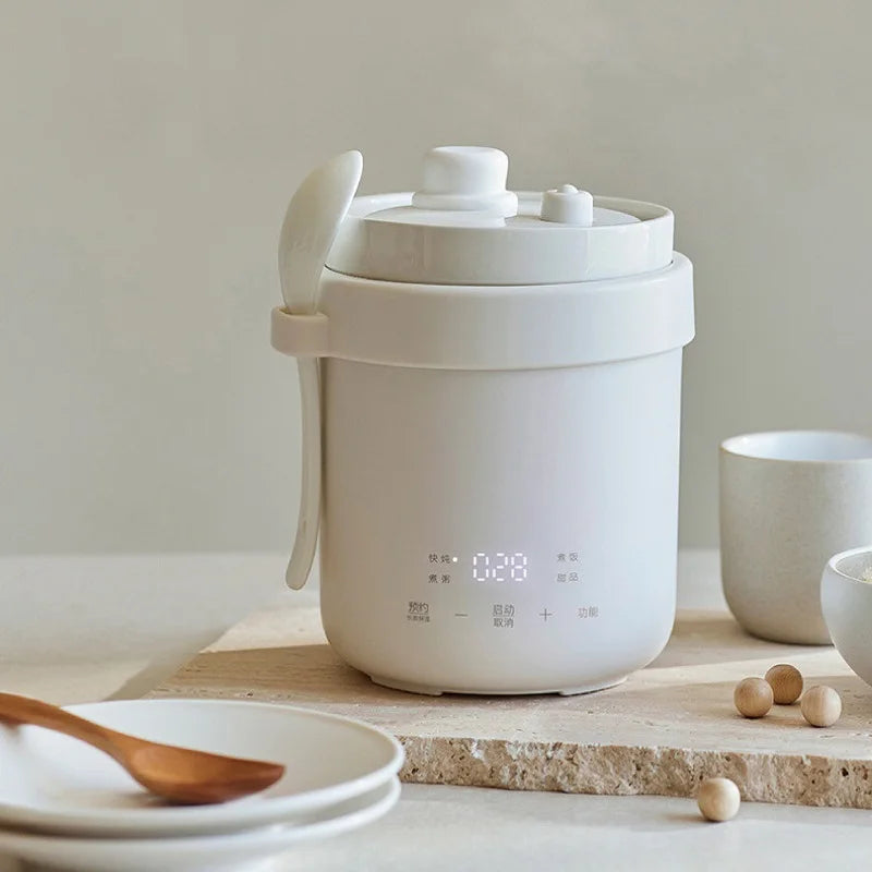 Smart white 600ml ceramic non-stick electric cooker pot with lid and spatula.