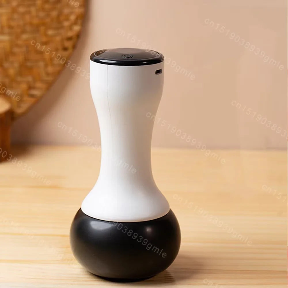 Electric Bian stone Gua Sha massager with a white hourglass-shaped handle and a smooth, rounded black massage head.