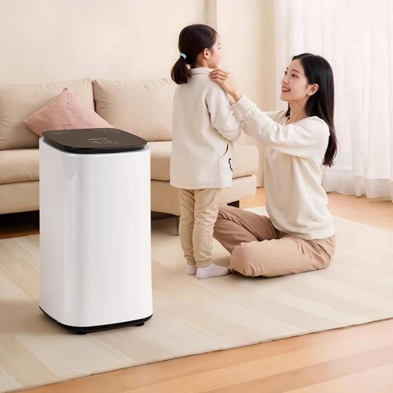 Tidesmit 60L automatic clothes dryer with baby clothing disinfection and air-drying interior view